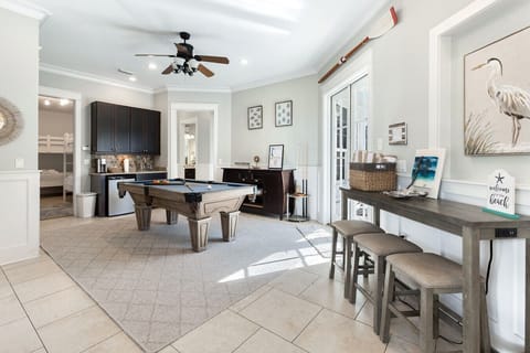 1st floor pool table, bar area, large queen bunk room