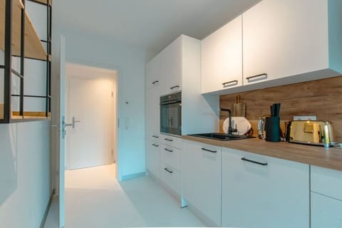 The kitchen with modern appliances.