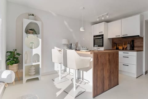 Dining area + kitchen. The area invites you to relax.