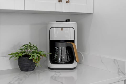 Wake up to fresh coffee and a calm start in your fully equipped kitchen