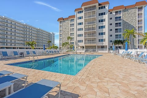 Sand Caper Beachfront Condos with Resort Sized Heated Pool and Sundeck