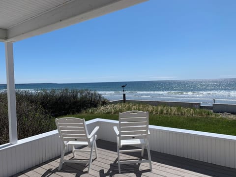 Enjoy your morning coffee and then watch the surf all day long.