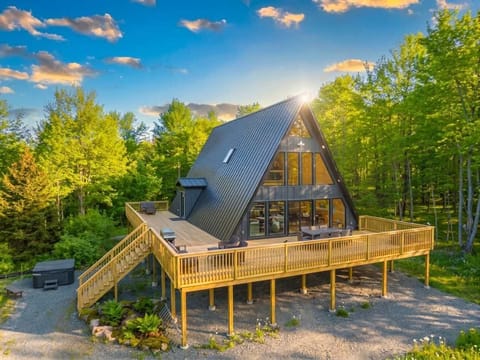 Iconic A-Frame exterior with oversized wraparound deck