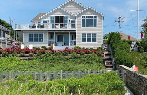 Beautifully landscaped yard with mature plantings and flowers