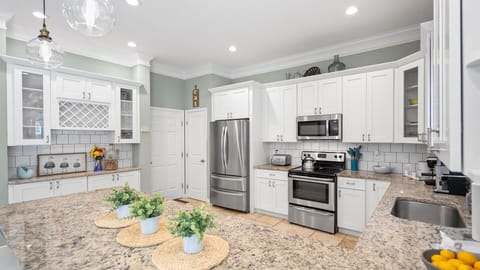 Back door opens up to garage w/ game room 