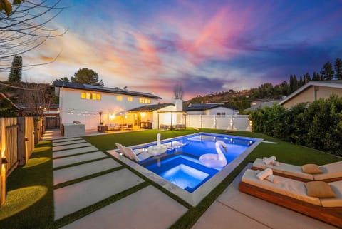 Luxury backyard with pool and sunset views