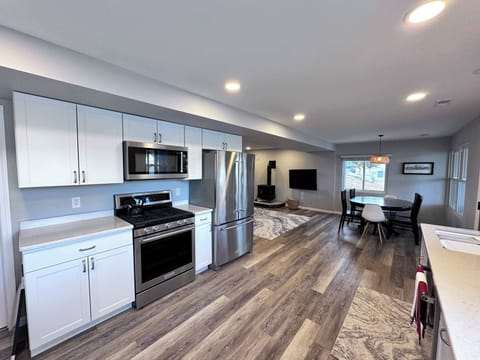 The kitchen offers ample space & all the comforts of home