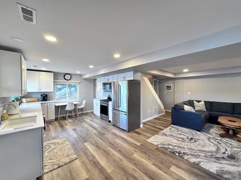 The kitchen offers ample space & all the comforts of home with additonal seating for 2