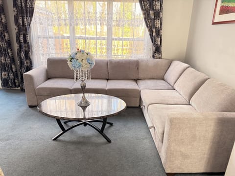 Living room with brand new sectional sofa