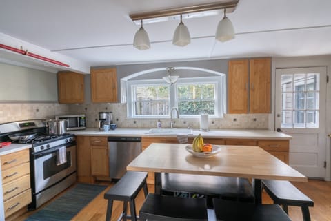 Kitchen adjacent to large outdoor patio