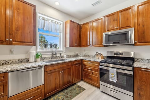 kitchen with dishwasher and large single basin sink