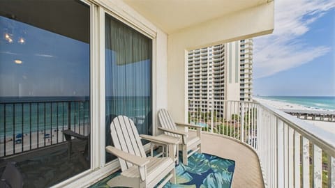Wrap around balcony with seating and coastal views and resort views