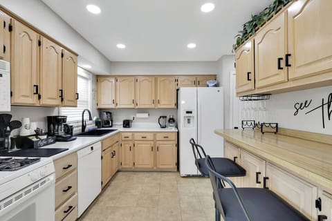 Stove, coffee maker, dishwasher, blender, refrigerator, microwave and utensils