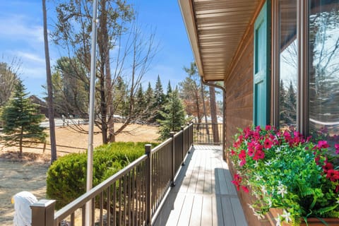 Wrap around deck on the front of the house. 