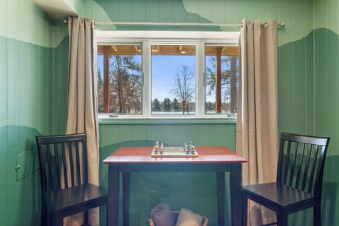 Play a game of chess while gazing at the lake. Plug in your laptop - or don't!