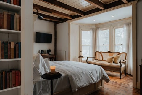 Bright and airy, the Dickinson Room boasts large bay windows, flooding the space with natural light. Relax in the charming seating area and take in the scenic views.