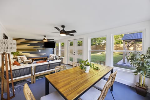 Gorgeous Sunroom with TV and seating