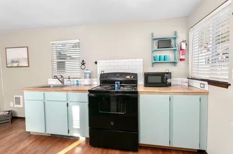 Bright, well equipped kitchen designed for easy meals