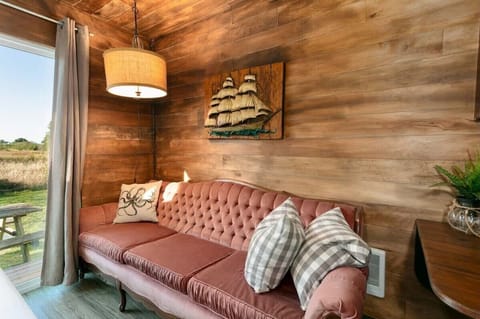 Curl up and relax in this cozy cabin nook