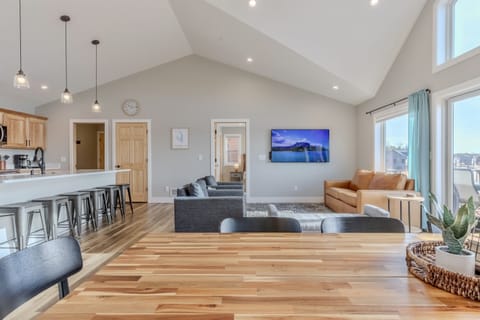 Upstairs open concept kitchen, dining and living area.