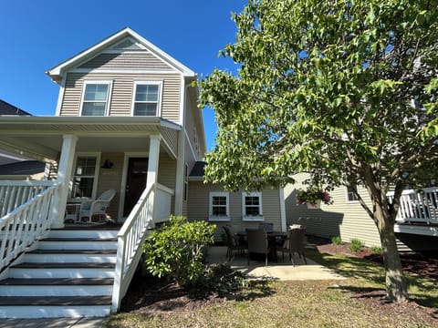 Front porch and side patio with fire table.