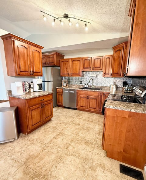 Large eat in kitchen with amenities to cook a snack or gourmet meal
