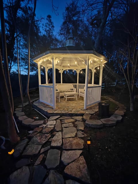 Gazebo with lightning in the night