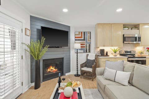 Spacious living room with elegant coastal charm.

