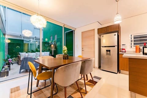 For enjoying a sit-down meal, the stylish dining table can seat 6