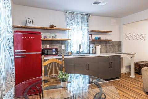 Clean, uncluttered, and stocked with everyday necessities—this kitchen keeps things easy and functional.