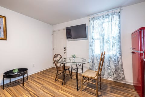 Simple and functional, the dining nook seats two comfortably for meals, planning, or remote work.