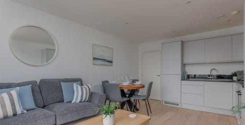 The living room is bright and spacious and offers a relaxing atmosphere