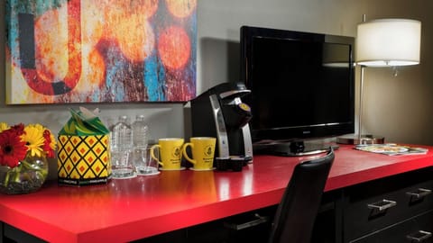 Start your morning with in-room coffee and an easy workspace setup