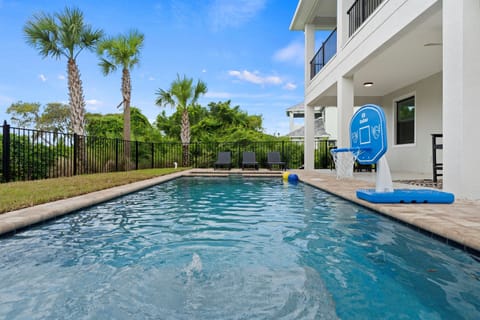 Refreshing private pool with loungers and a fun basketball hoop for hours of outdoor enjoyment