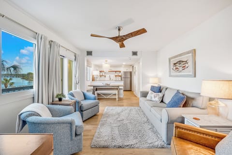 Living Room - The living room is spacious and open to the dining area and kitchen.