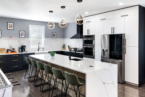 Kitchen with oversized island, seating for groups & premium appliances