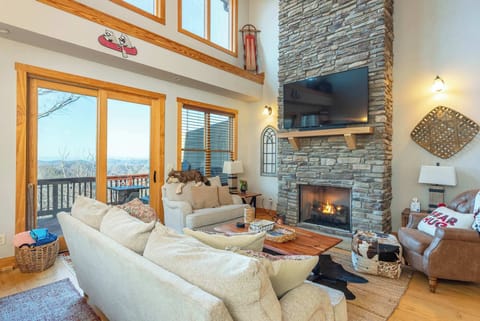 Welcome to Our Living Area! – A spacious, cozy retreat with plush seating, expansive windows, and an open floor plan, perfect for relaxation and gathering.