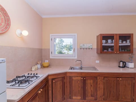 Countertop, Wood, Cabinetry, Interior Design, Kitchen, Flooring, Kitchen Appliance, Furniture, Major Appliance, Ceiling