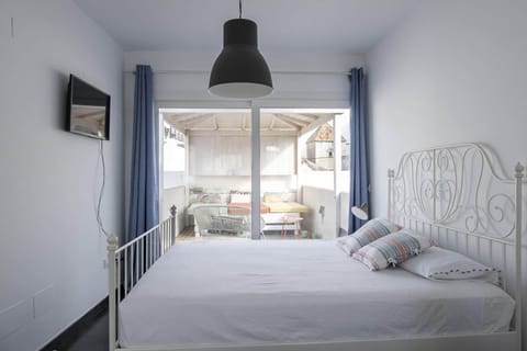 Tarifa chic rooftop penthouse main bedroom terrace view
