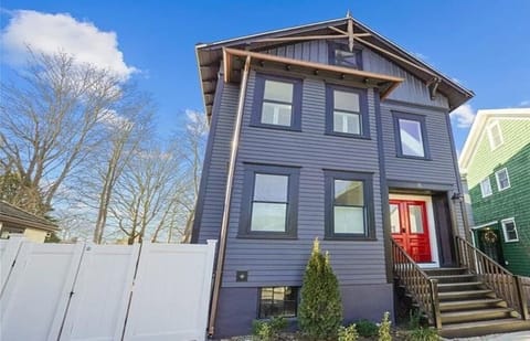 Two Unit House, primary entrance in front with separate interior entrance Unit 1