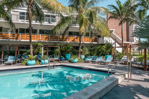 Soak up sunshine with loungers and lush greenery all around.
