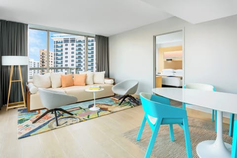 Stretch out in the airy living room with natural light.