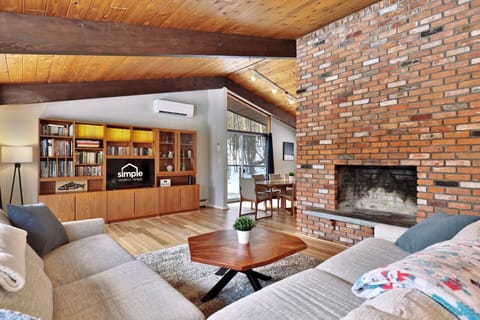 Cozy up in the spacious, light-filled two living rooms of the Killington Bungalow.