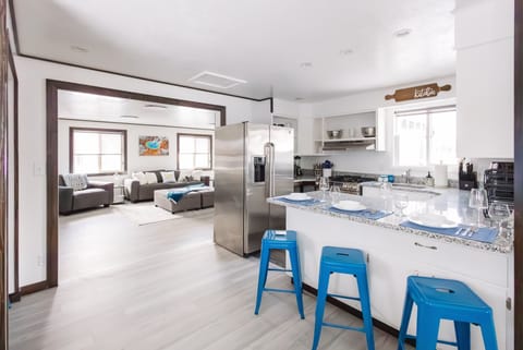 Kitchen with access to living room
