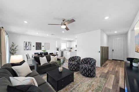Living Room: Cozy and inviting space with comfortable seating, soft lighting, and a relaxing ambiance — perfect for unwinding, or spending quality time with loved ones.