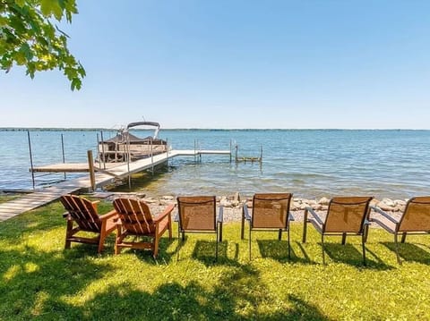 Relax with breathtaking lake views from this private waterfront oasis! Enjoy morning coffee by the shore or unwind in the evening as the sun sets over the water. 