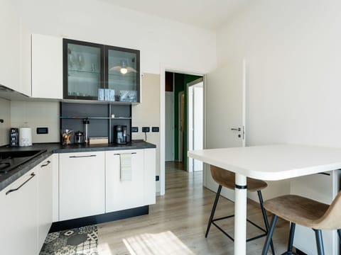 Furniture, Interior Design, Flooring, Kitchen, Countertop, Wood, Floor, Room, Kitchen Appliance, Ceiling