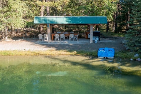 Lakeside fishing and cookouts await at the communal gazebo, with a grill