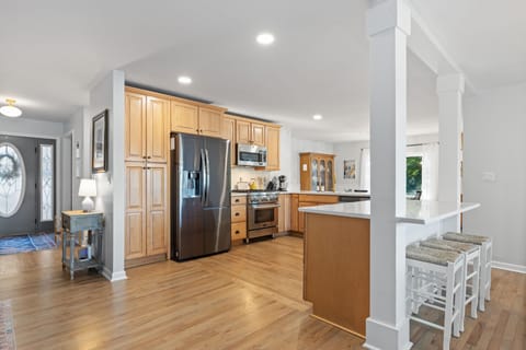 The fully stocked kitchen is the center of the open floor plan on main level.