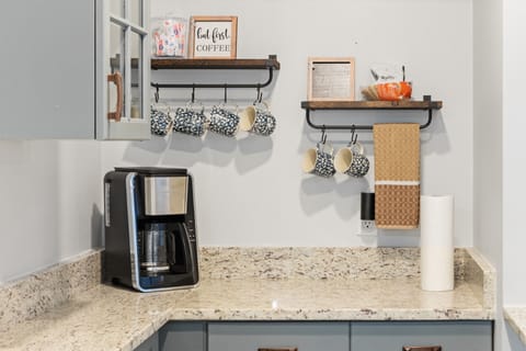 Kitchenette in downstairs living space situated between two bedrooms.